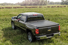 Load image into Gallery viewer, Roll-N-Lock 15-18 Chevy Silverado/Sierra 2500/3500 LB 96-3/8in M-Series Retractable Tonneau Cover