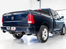Load image into Gallery viewer, AWE Tuning 09-18 RAM 1500 5.7L (w/Cutouts) 0FG Dual Rear Exit Cat-Back Exhaust - Diamond Black Tips